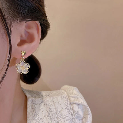 Elegant Hollow Flower Hoop Earrings - Stylish Metal Jewelry for Women