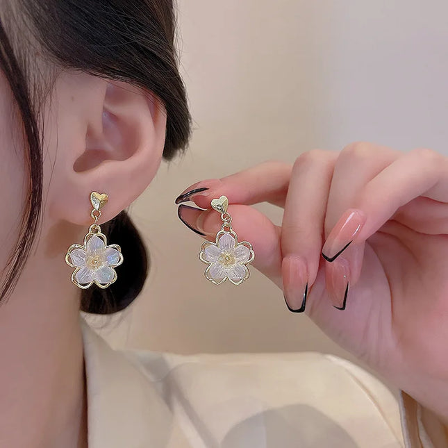 Elegant Hollow Flower Hoop Earrings - Stylish Metal Jewelry for Women